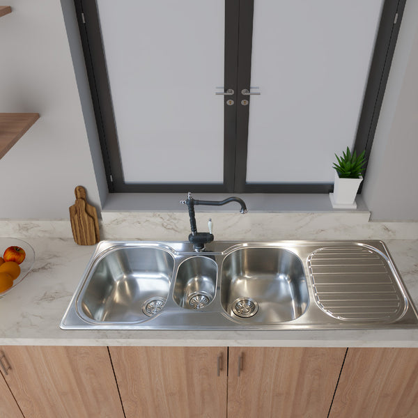 Franke Compact CPX 671 2 & 1/2 bowl sink in stainless steel, featuring one large bowl, one small bowl, and an additional half bowl for efficient multitasking. Top mount installation with a modern design, equipped with a 3.5” waste fitting and overflow