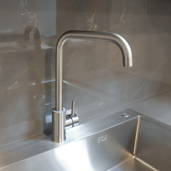 Modern Stainless Steel Gooseneck Kitchen Mixer with Single Lever & Ceramic Disc Cartridge – A premium kitchen faucet with a high-arc design, smooth water flow, and leak-free performance, perfect for contemporary kitchens.